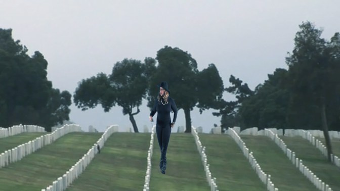 Classy Silhouette Flying over tombstones in cemetery in scene in Off With Your Head Video